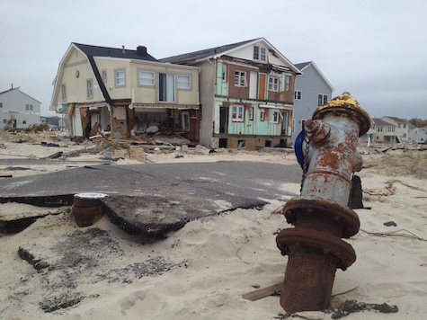 destroyed house and road